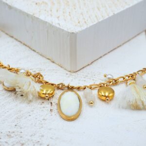 Braccialetto con nappine e charms